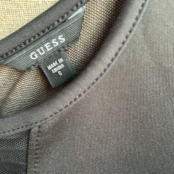 GUESS fitted peplum cocktail dress. Full mesh back & sexy mesh detail on front. - Picture 3 of 9